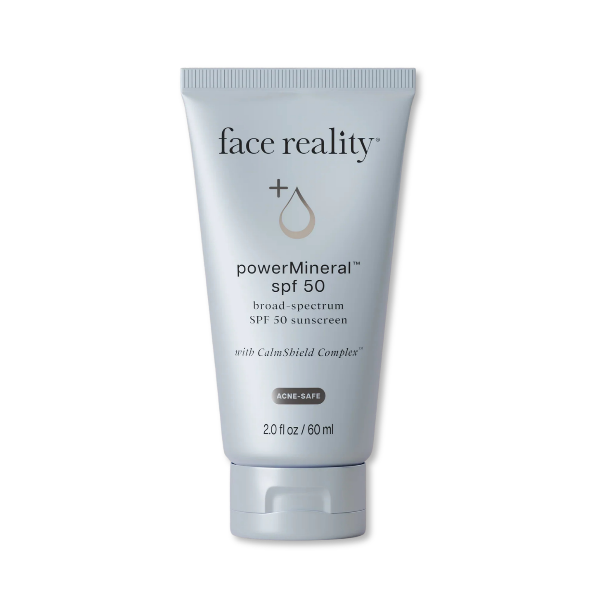 A tube of face reality + powerMineral SPF 50 Broad Spectrum Sunscreen on a plain white background.